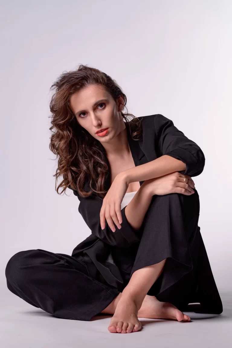 A modern, high-fashion studio portrait of Jana Miletić in an editorial-style pose by Sinisa Zec Studio